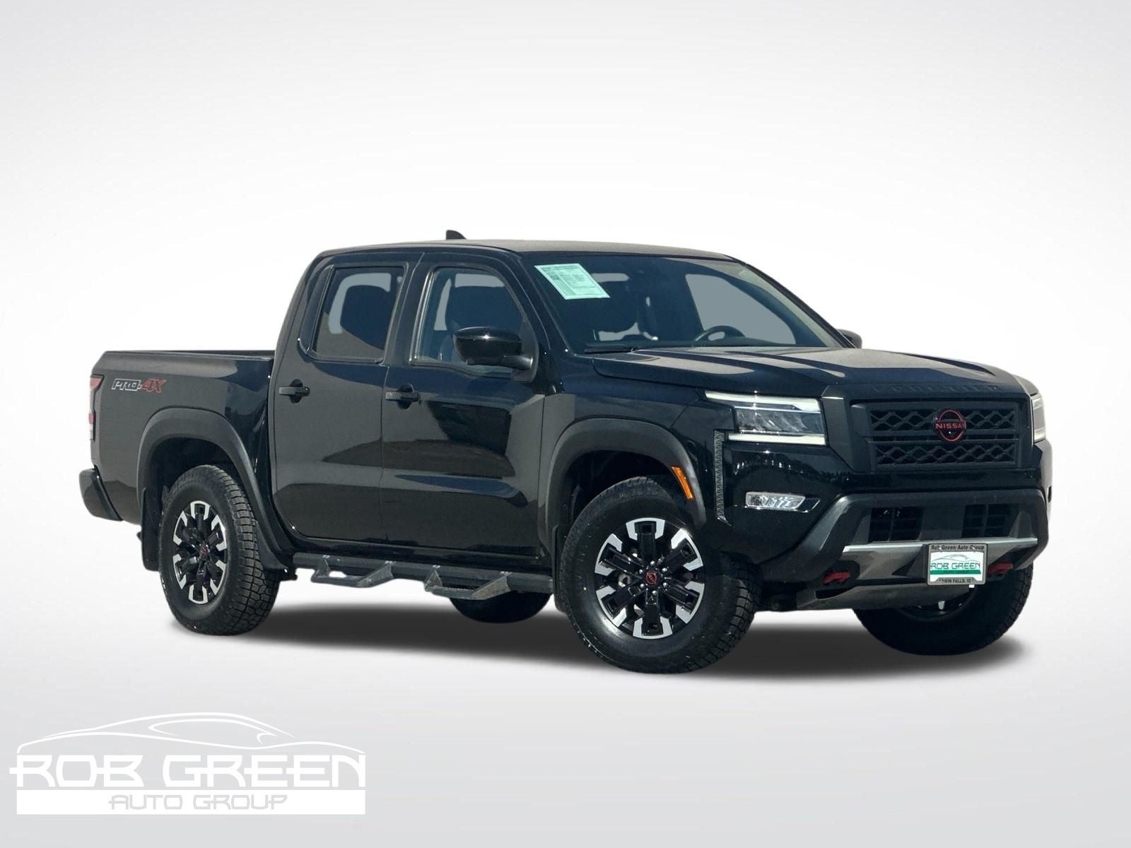 2023 Nissan Frontier PRO-4X in Super Black — front three-quarter view