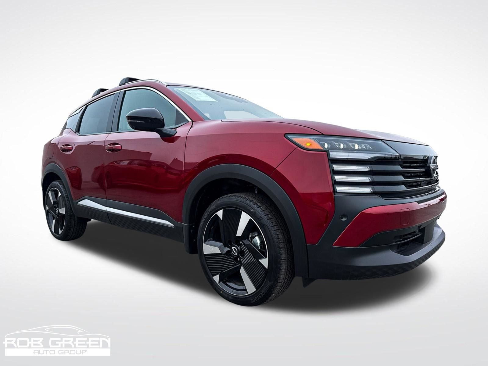 2026 Nissan Kicks SR in Scarlet Ember Tintcoat — front three-quarter view