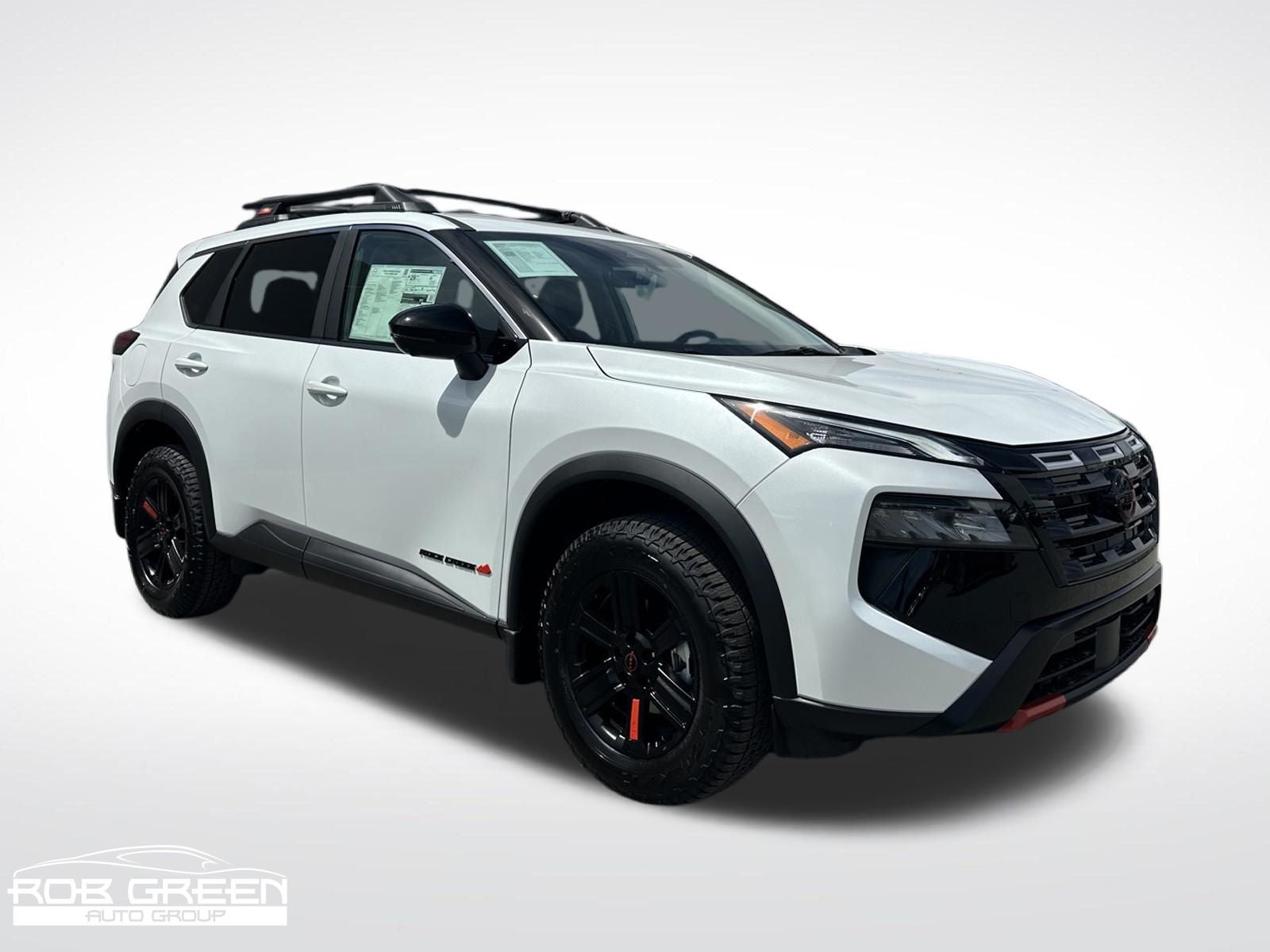 2026 Nissan Rogue Rock Creek in Everest White Pearl Tricoat — front three-quarter view