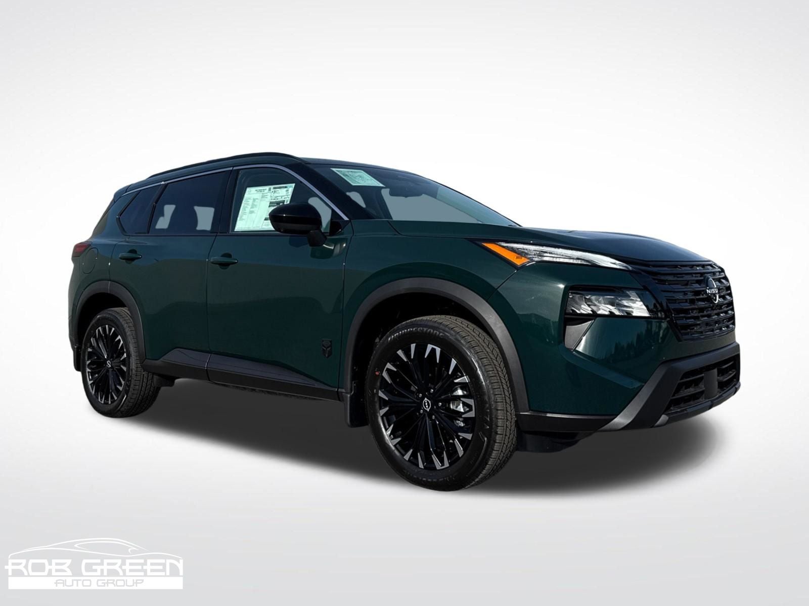 2026 Nissan Rogue Dark Armor in Obsidian Green — front three-quarter view