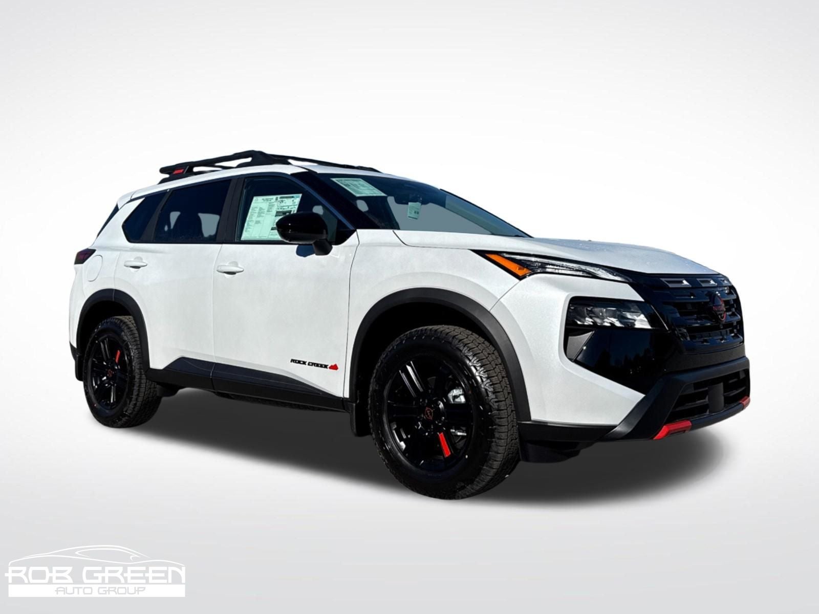 2026 Nissan Rogue Rock Creek in Everest White Pearl Tricoat — front three-quarter view