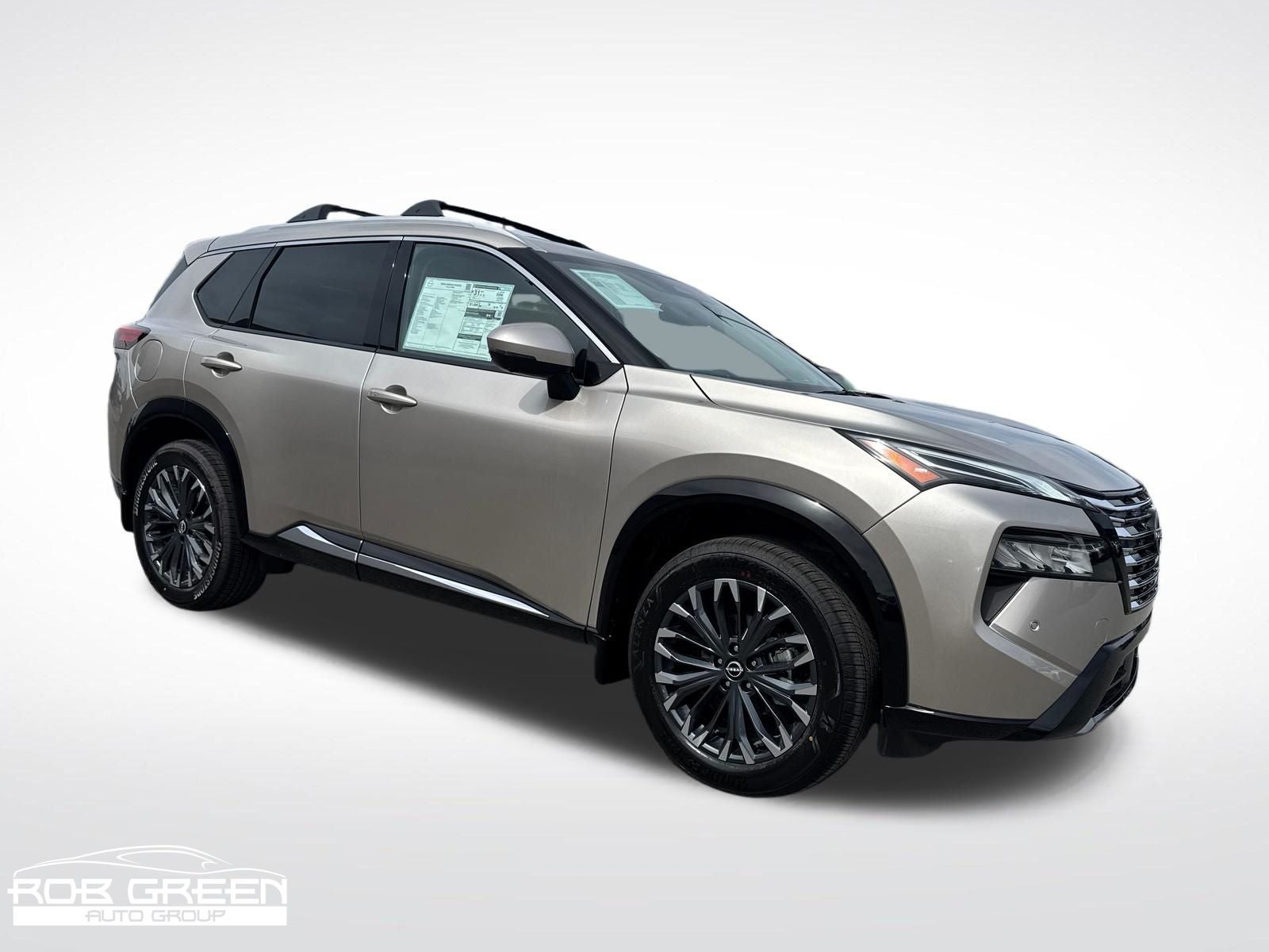 2026 Nissan Rogue Platinum in Champagne Silver Metallic — front three-quarter view