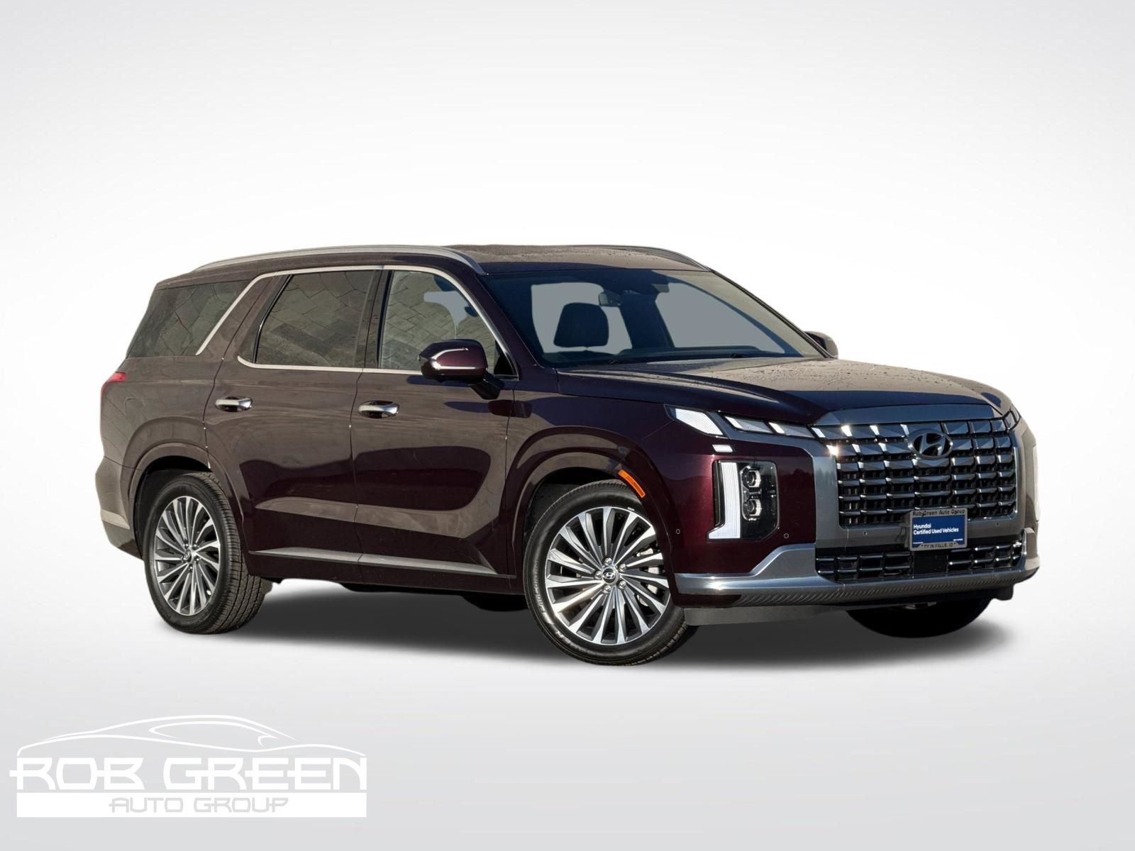 2024 Hyundai Palisade Calligraphy in Sierra Burgundy — front three-quarter view
